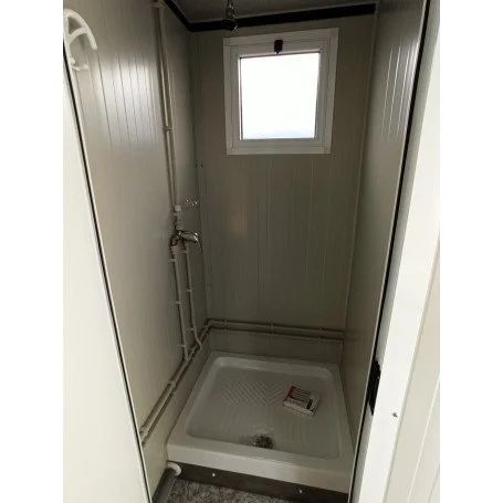 Sanitario SDU con WC, ducha, lavabo y urinario - Imagen 10